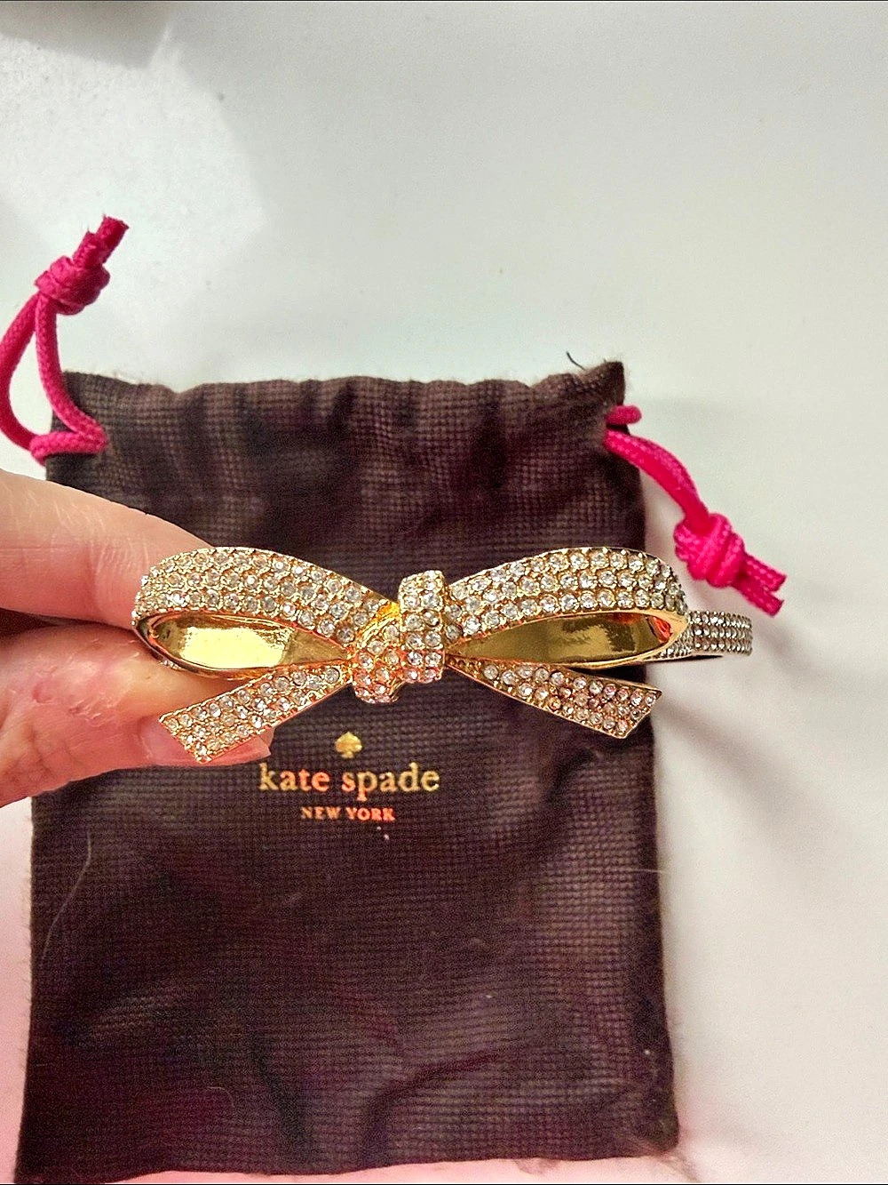 Kate Spade Rhinestone Bow bracelet in Gold pave Like New